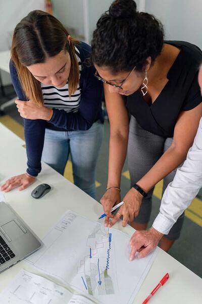 Engineering teacher demonstrating to student